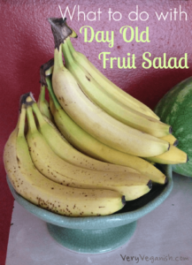 spotty bananas in a bowl next to a watermelon