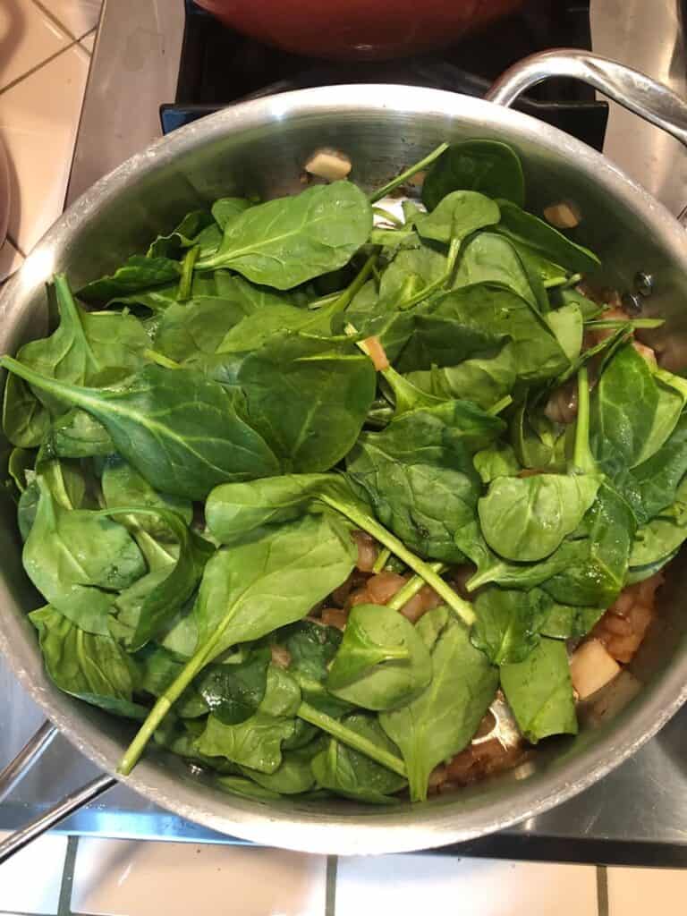 add spinach to pan