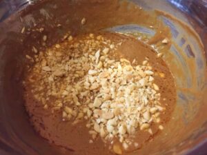 spicy peanut sauce in a metal bowl close up
