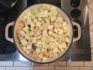 chopped eggplant cooking in a pot