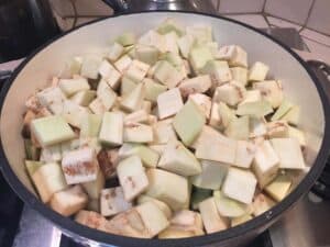 chopped eggplant in a pot closeup
