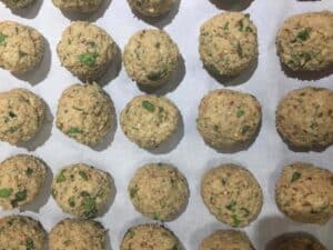 eggplant meatball uncooked on tray