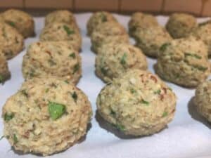 eggplant meatball uncooked on tray