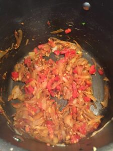 onions sautéing in pan