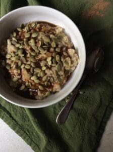 oatmeal with pumpkin seeds on top