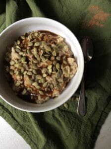 oatmeal with pumpkin seeds on top