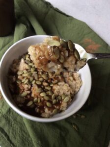 oatmeal with pumpkin seeds on top