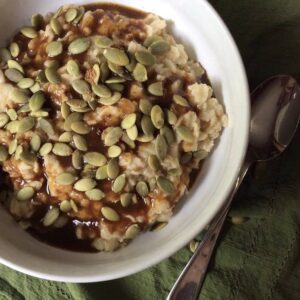 oatmeal with pumpkin seeds on top