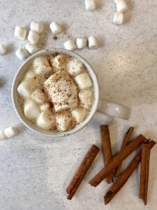 cinnamon and marshmellows in a cup