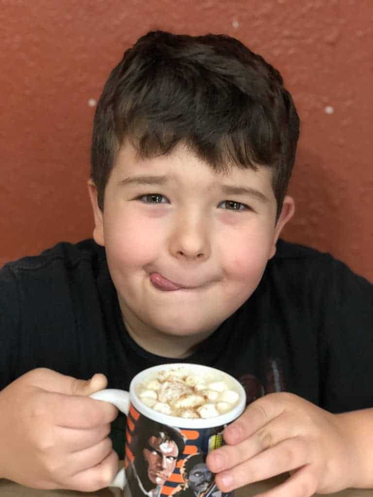 I think he likes it! Try these Kids Pumpkin Spice Steamer Autumn Bombs for a caffeine free hot kids drink that's not cocoa refined sugar free too