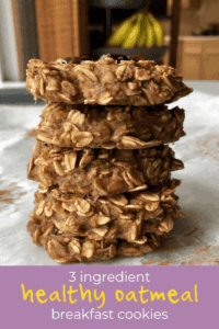 3 ingredient banana oatmeal breakfast cookies in a stack on parchment paper