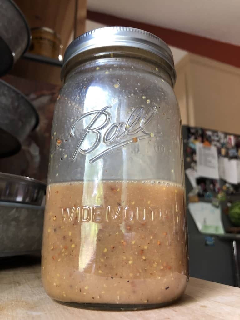 homemade oil-free honey mustard dressing in mason jar