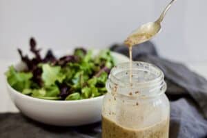 dripping off spoon into mason jar