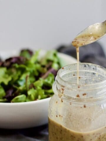 cropped-Spooning-Oil-free-salad-dressing-honey-mustard-1.jpeg