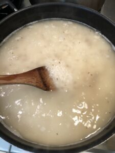 stirring cumin seed jeera rice