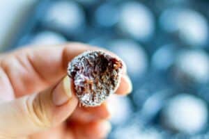 process shot, with bite of chocolate coconut date ball
