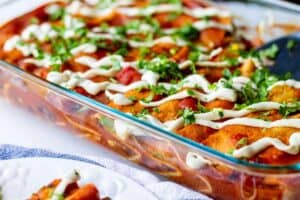 pan of enchiladas in background