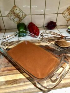 step 1 - glass baking tray with sauce