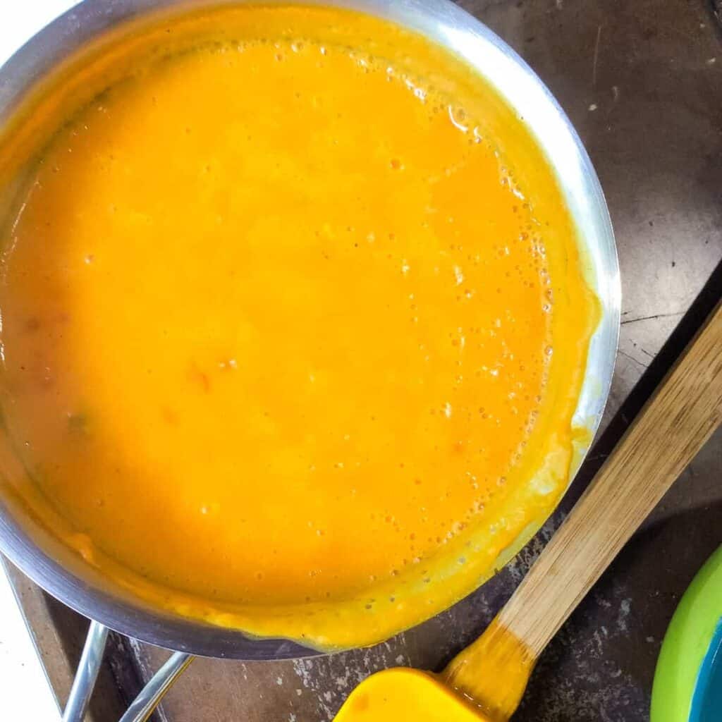 finished sauce in pot with spatula