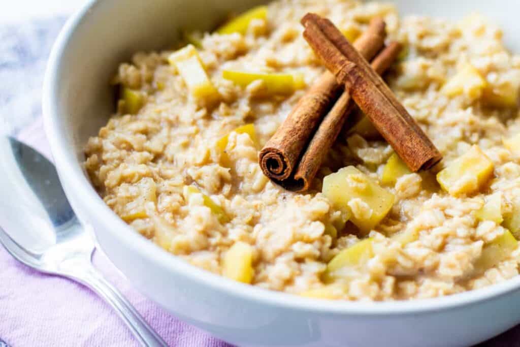 white bowl of apple pie spiced oatmeal