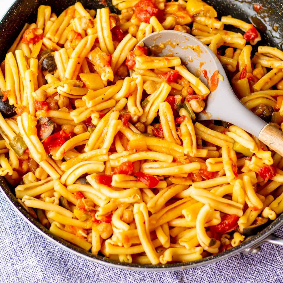 casarecce pasta with vegetables, chickpeas in pan