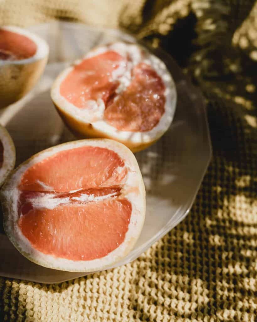 sliced pomelo on plate