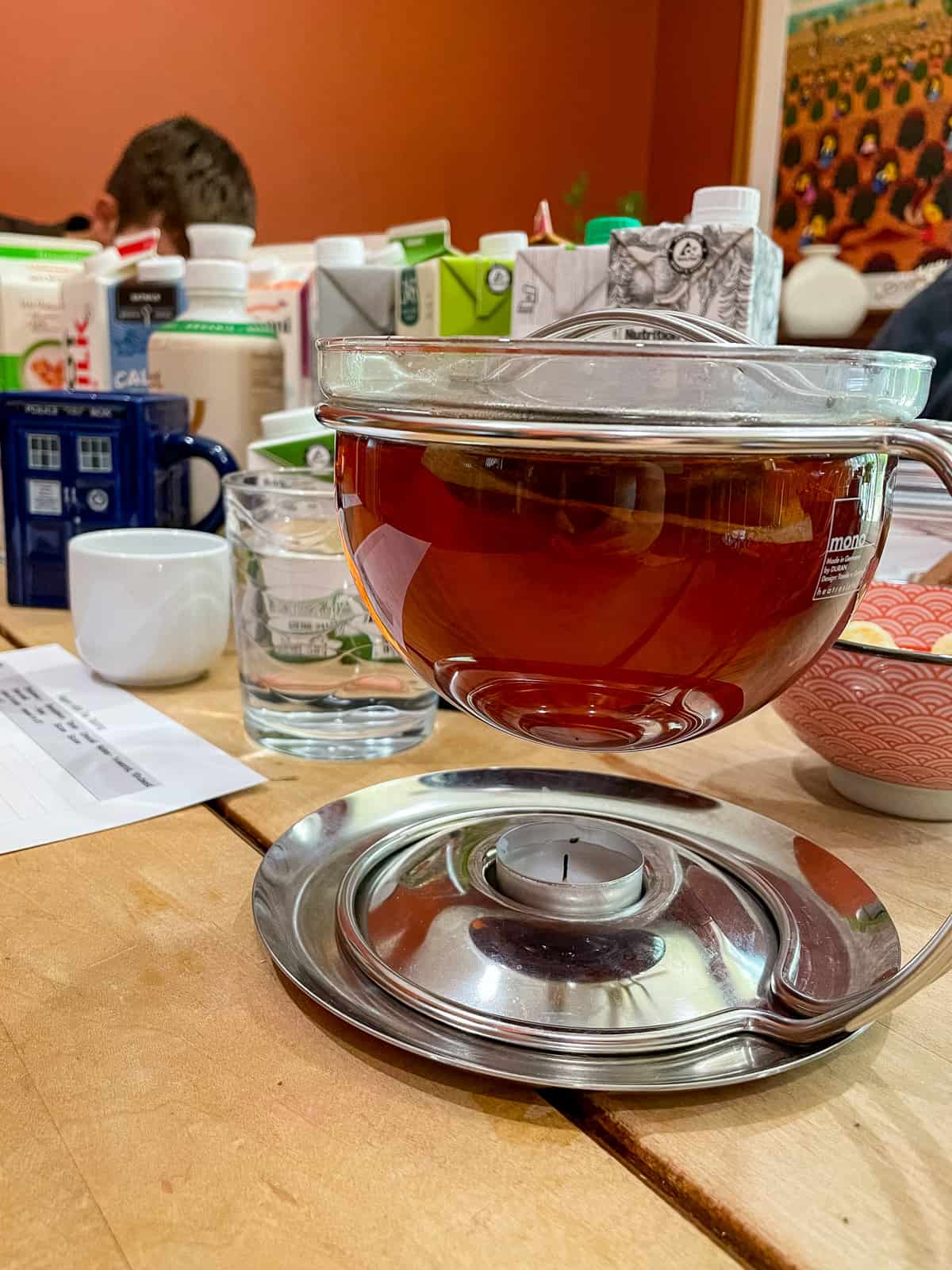 pot of yorkshire gold black tea steeping in glass tea pot