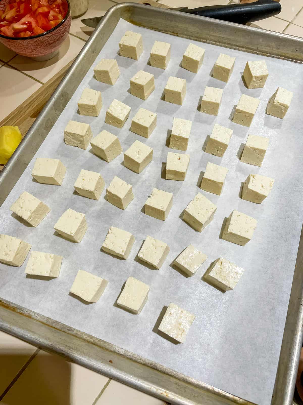 Step 1 Cube and place tofu on baking tray