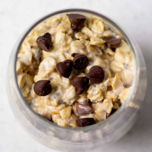 glass with overnight oats and chocolate chips