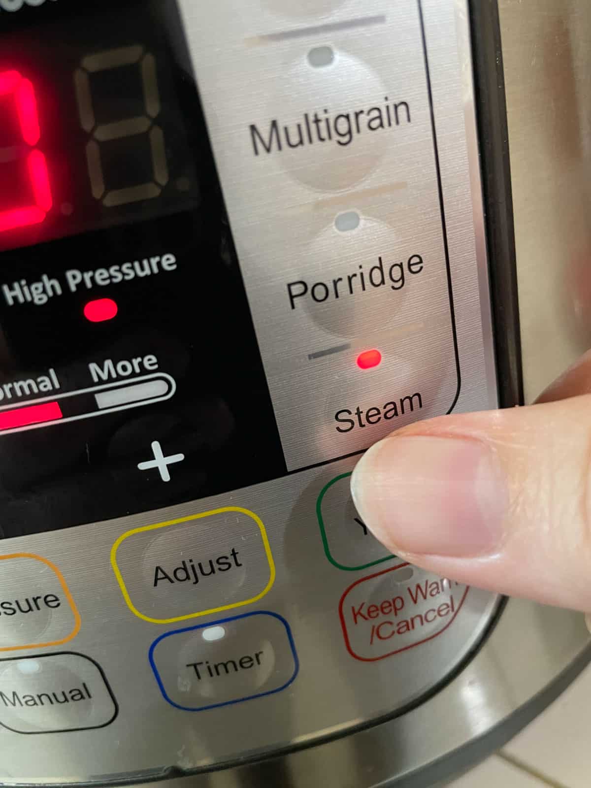 pressing steam button on Instant Pot