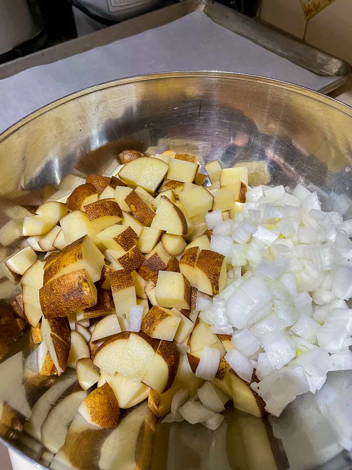 Process step 1 add diced potatoes and onion to bowl
