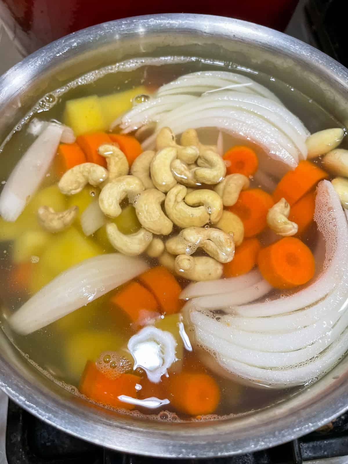 Process step 1 boil potato, carrot, onion, cashews