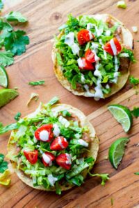 Tostada-de-Frijoles-Vegan-Tostadas-with-Refried-Beans-Lettuce-Tomato-Avocado-and-Crema-4