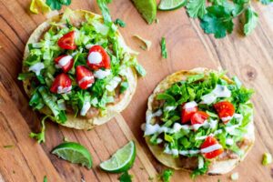 Tostada-de-Frijoles-Vegan-Tostadas-with-Refried-Beans-Lettuce-Tomato-Avocado-and-Crema-4