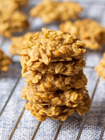 5 stacked 4-Ingredient Banana Oatmeal Peanut Butter Cookies on tray