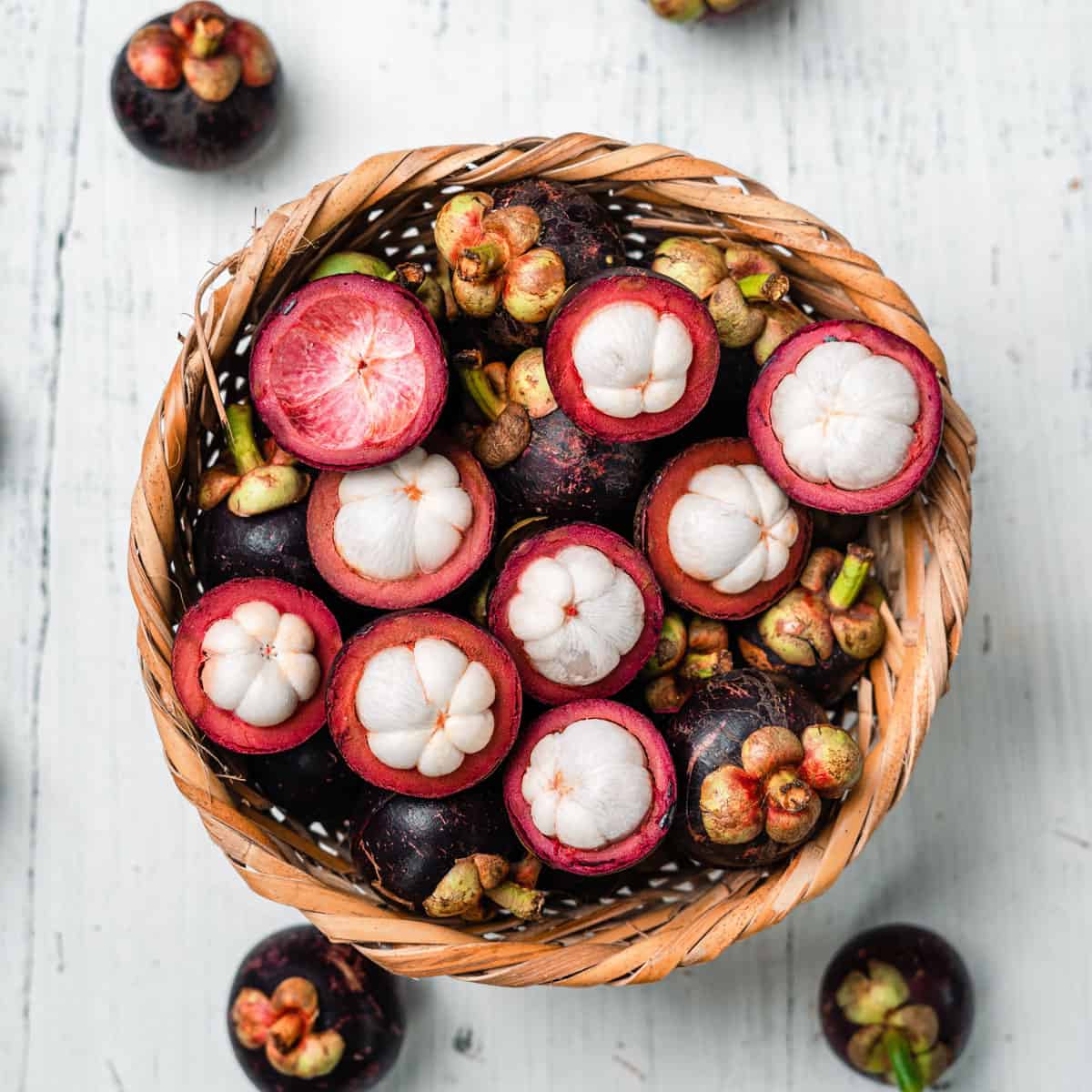 pink mangosteen pink fruit in basket