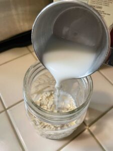 Step-2-add-plant-based-milk-How-to-make-basic-vegan-overnight-oats