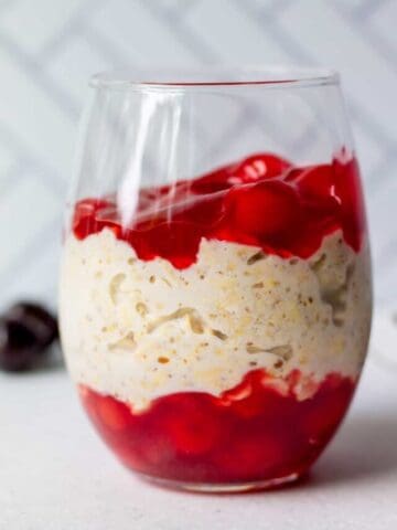 Vegan cherry pie overnight oats in a glass jar