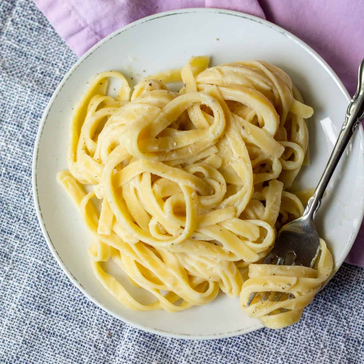 plate of fettucine alfredo with cauliflower sauce