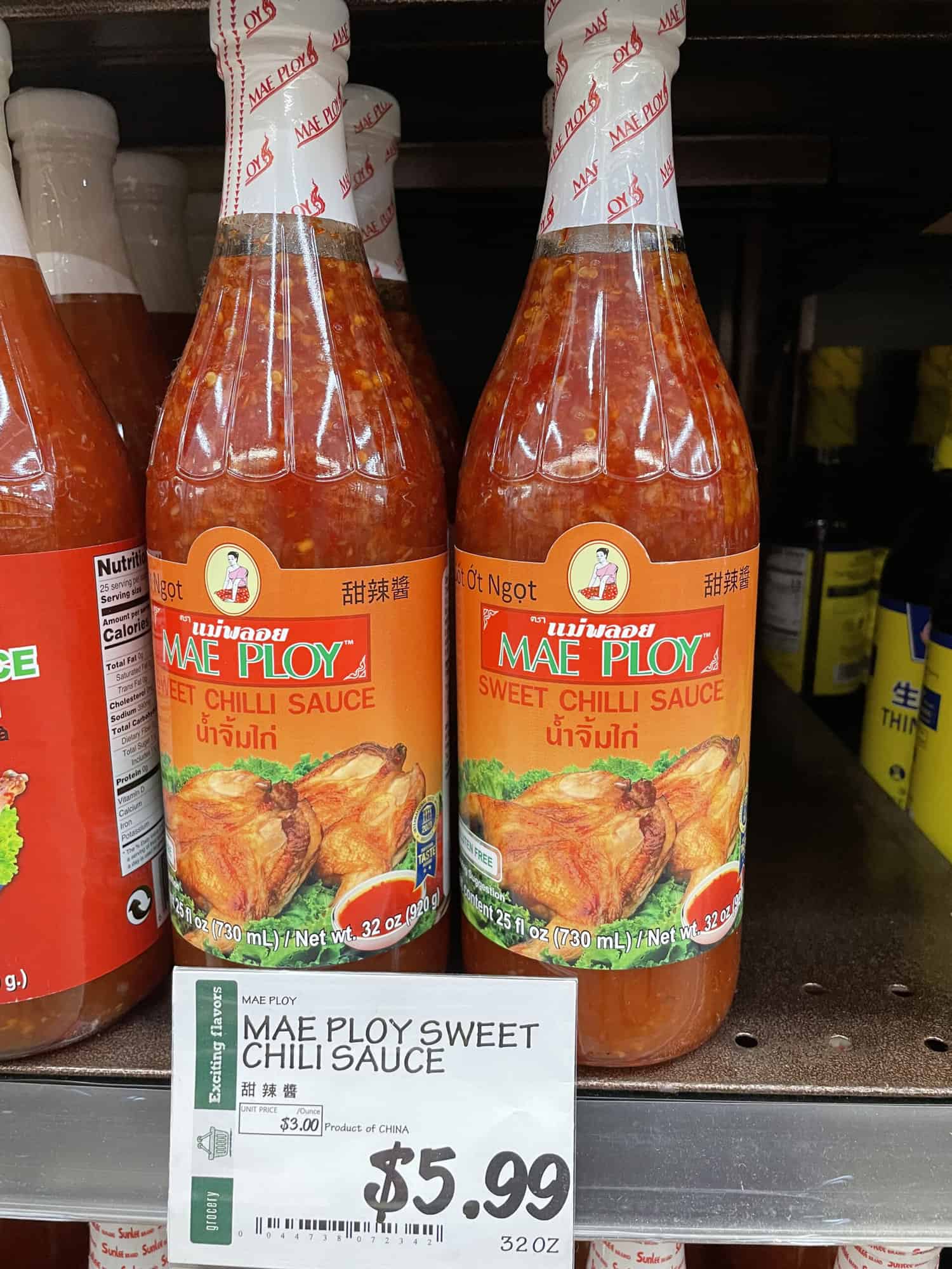 Bottles of Mae Ploy Thai Sweet Chilli Sauce at H mart