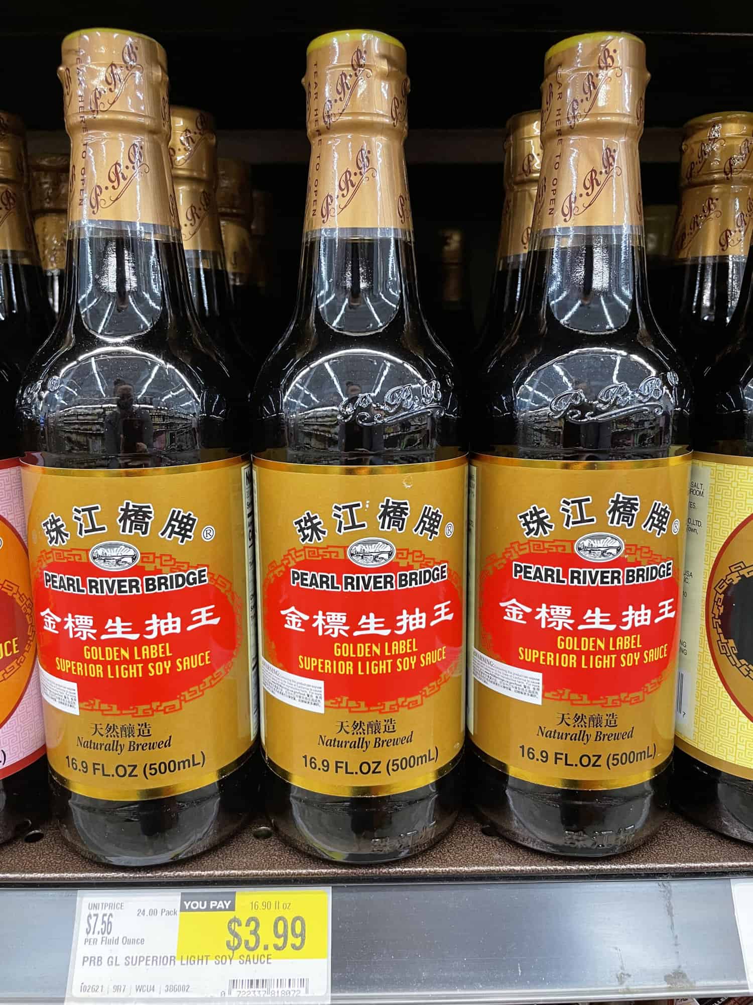 Bottles of Golden Label Superior Light Soy Sauce by Pear River Bridge at H Mart