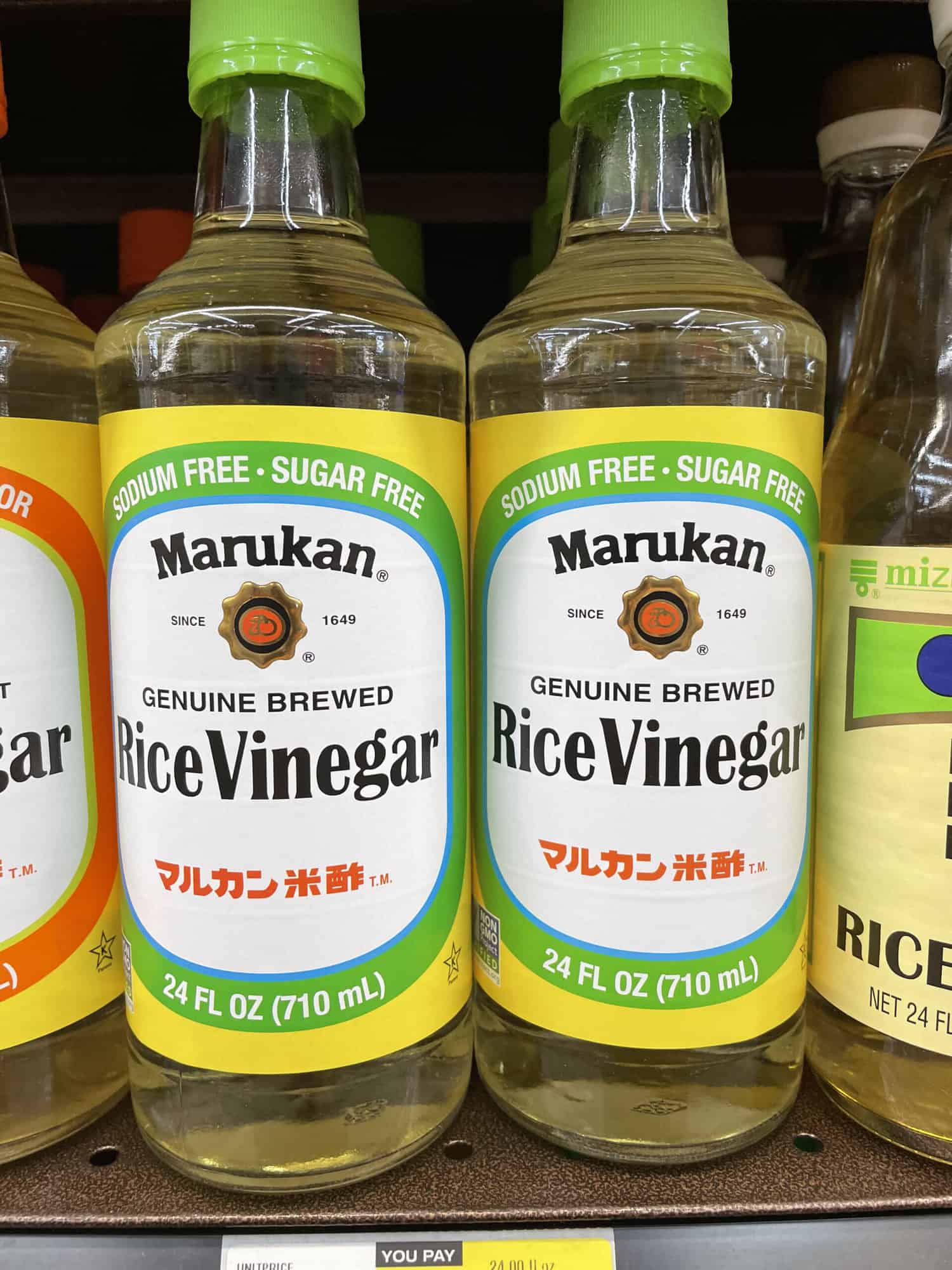 Bottles of unseasoned plain rice vinegar by Marukan at H mart