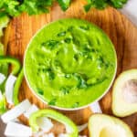 bowl of Venezuelan Creamy Avocado Cilantro Salsa guasacaca criollo con aguacate