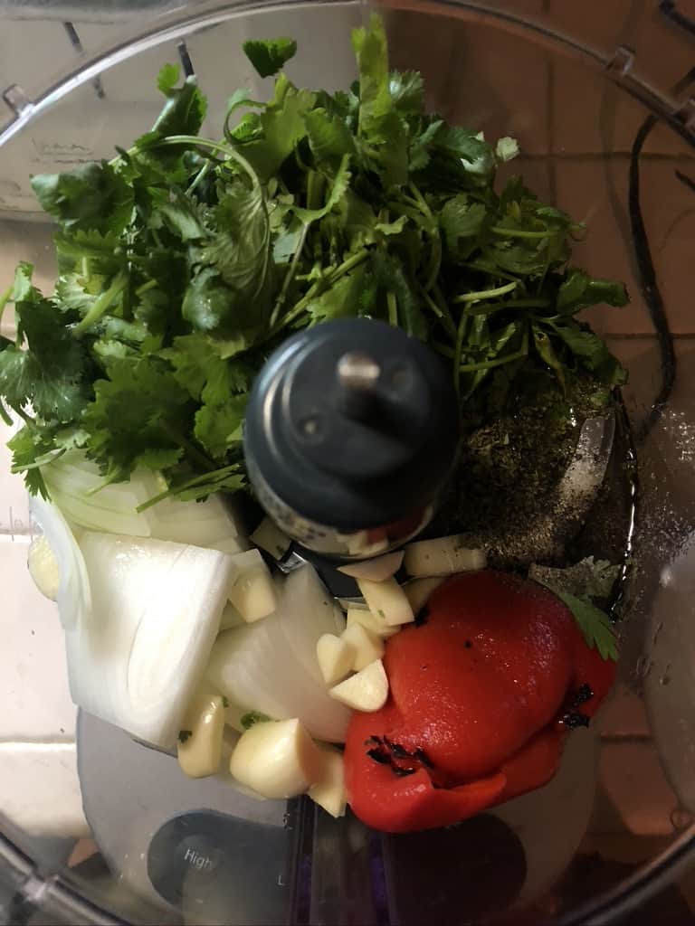cilantro, parsley, onion, garlic, roasted bell pepper in food processor