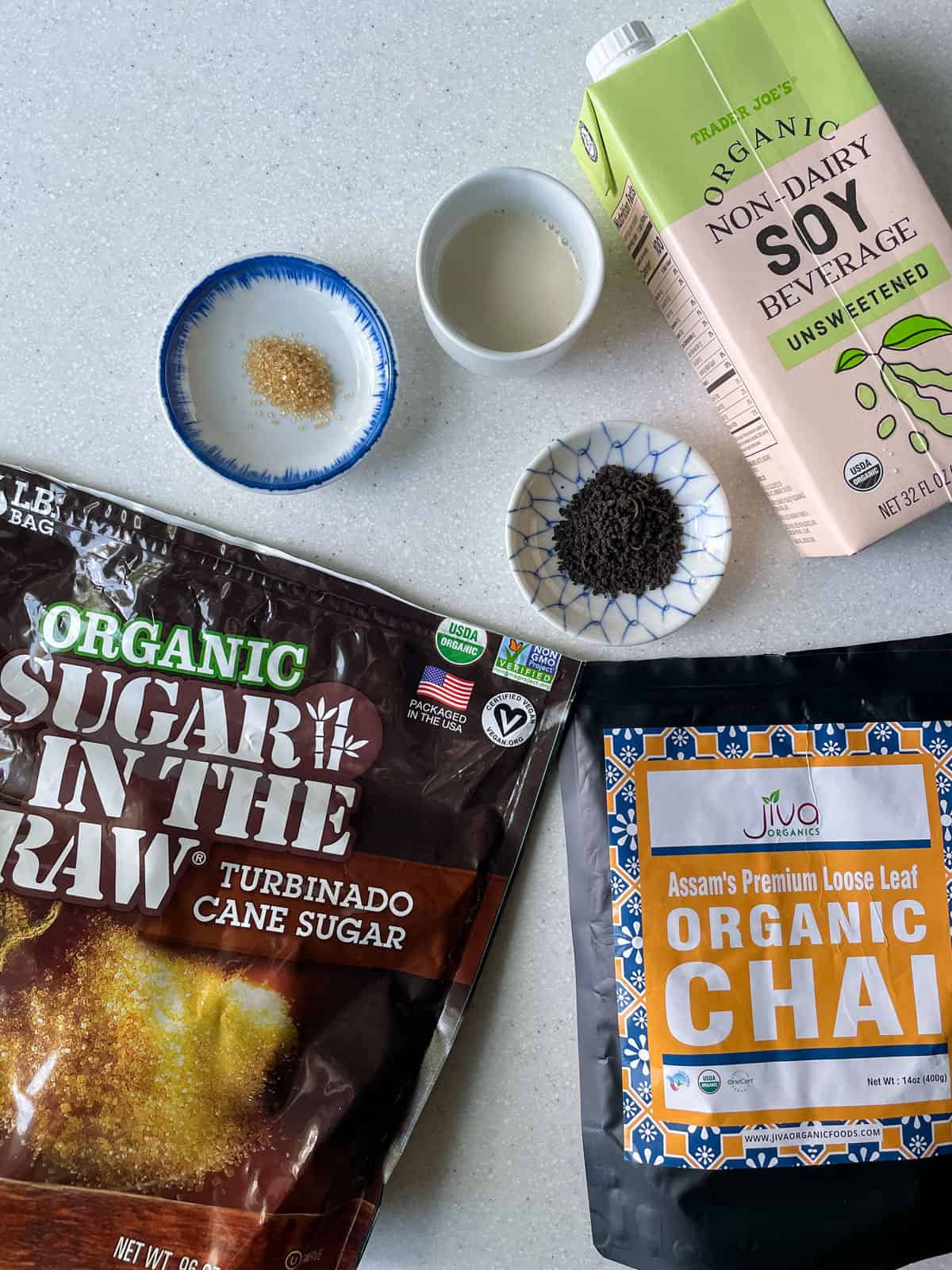Ingredients for hot black milk tea: assam premium loose leaf organic tea, raw sugar and organic soy milk from trader joe's