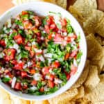 bowl of fresh pico de gallo with tortilla chips