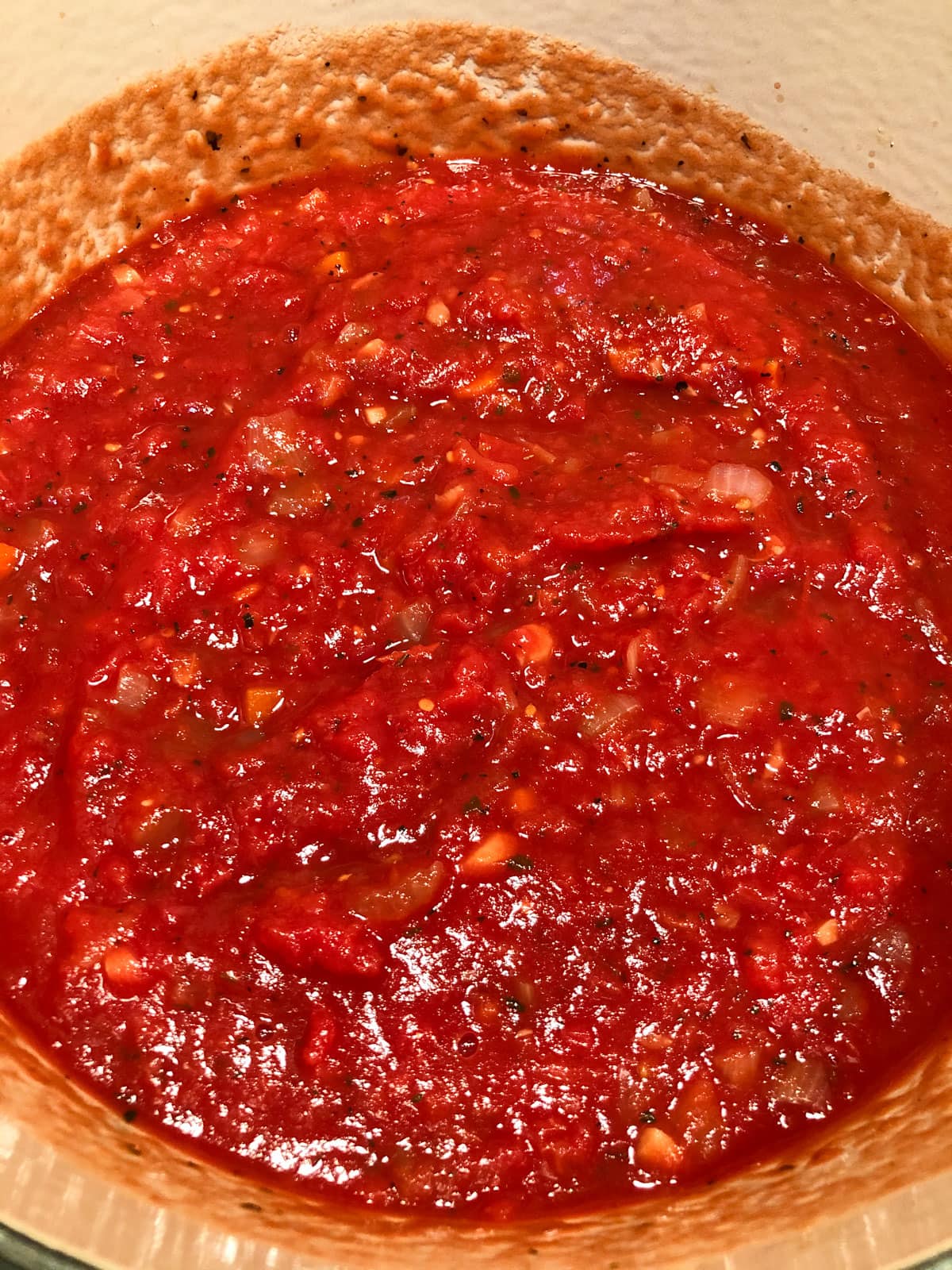 add tomato and simmer