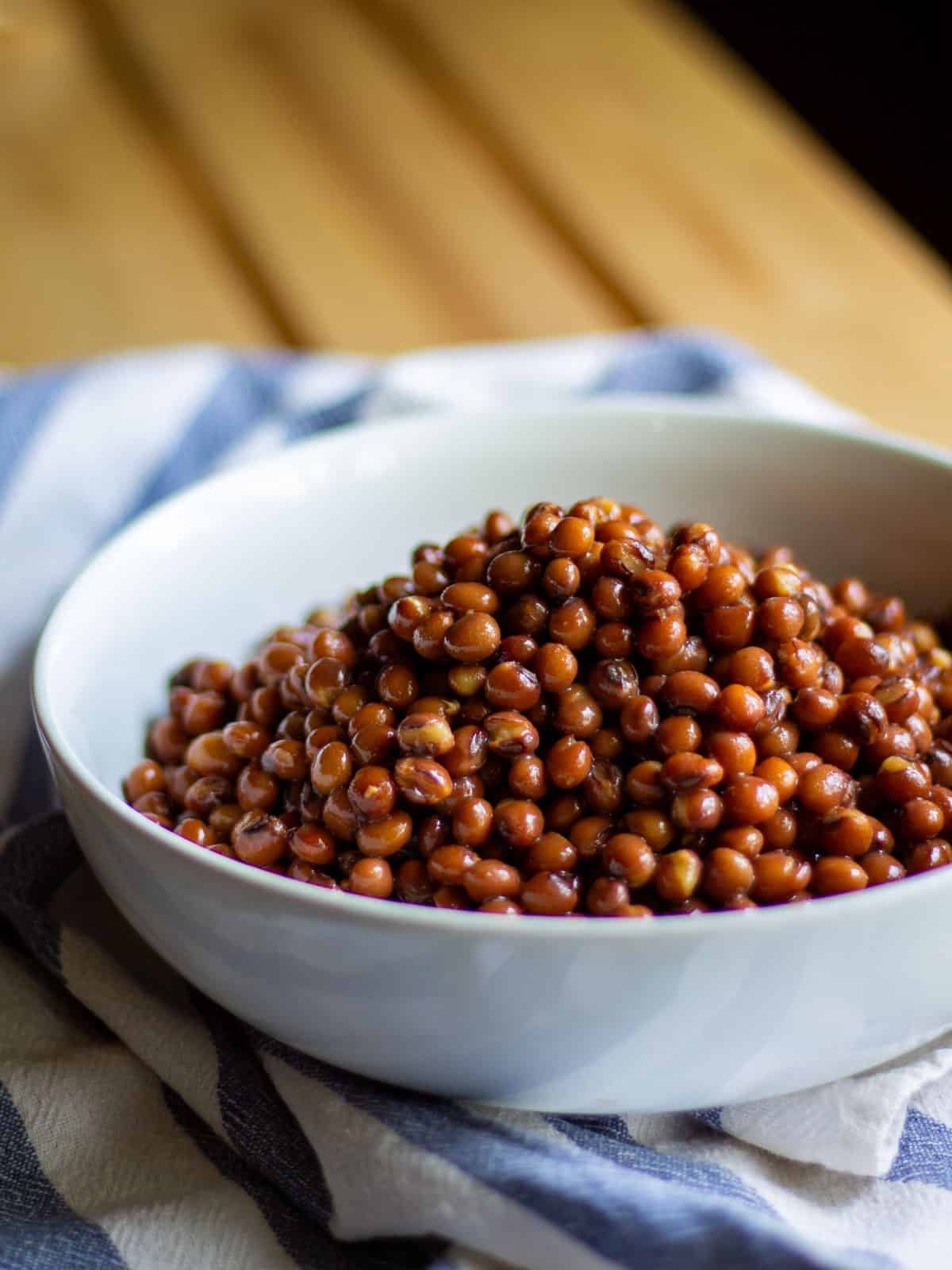 cooked pigeon peas from the pressure cooker in a white bowl