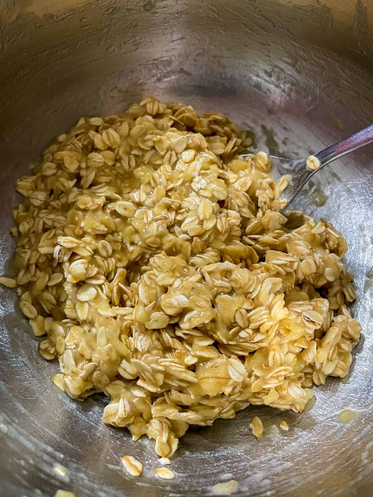 cookie batter mixed together in metal bowl