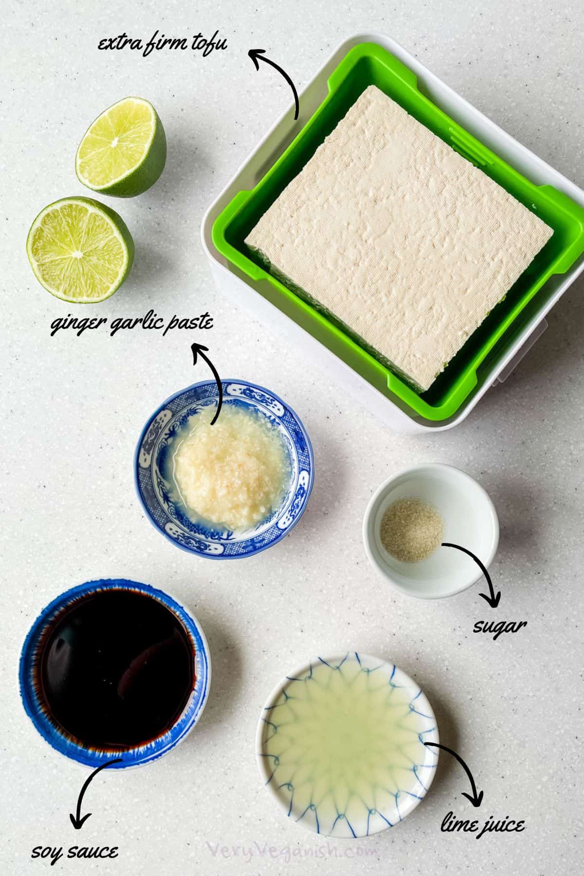 Ingredients for ginger lime tofu: extra firm tofu, ginger garlic paste, lime juice, soy sauce and sugar